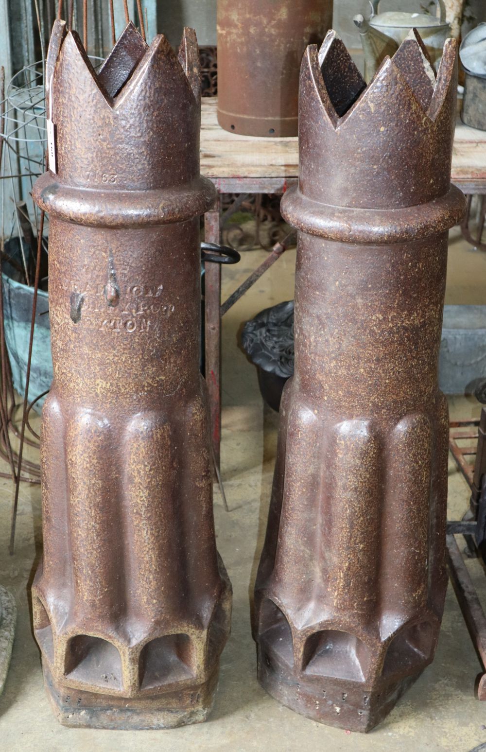 A pair of Victorian Champion earthenware chimney pots, H.114cm